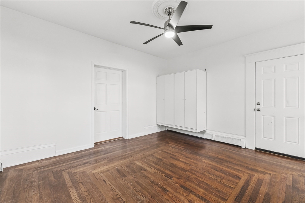 1142 Washington Street Whitman, MA 02382 - Photo 19 of 32 wooden floor in an empty room