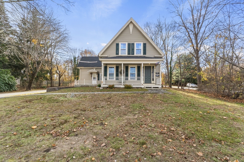 1142 Washington Street Whitman, MA 02382 - Photo 26 of 32 a front view of a house with a yard