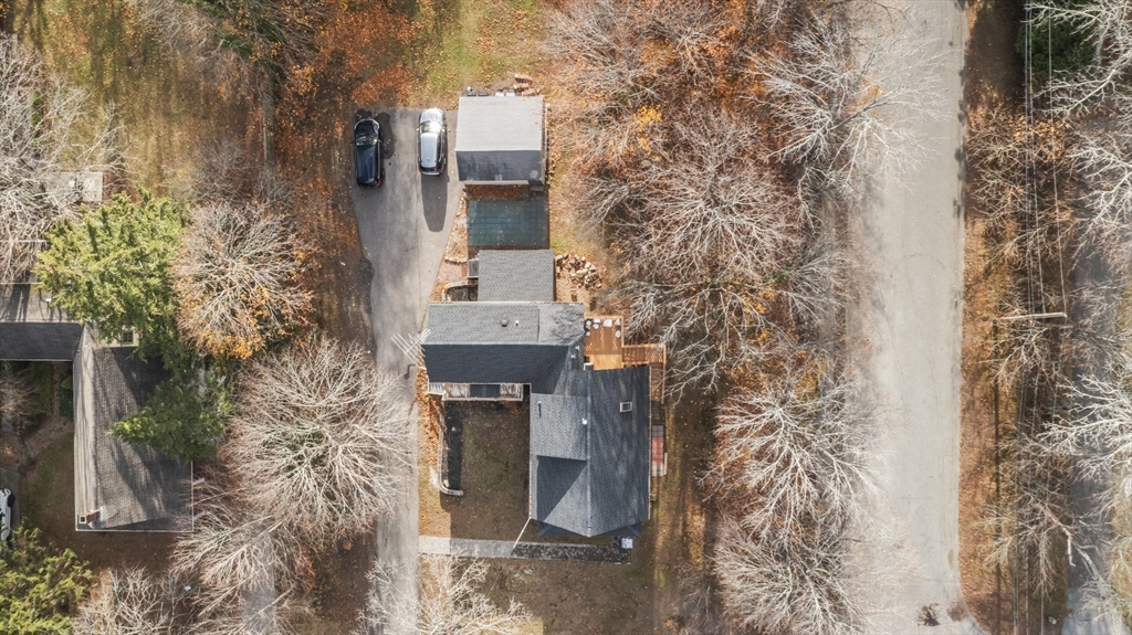 1142 Washington Street Whitman, MA 02382 - Photo 29 of 32 a pathway of a house with a yard