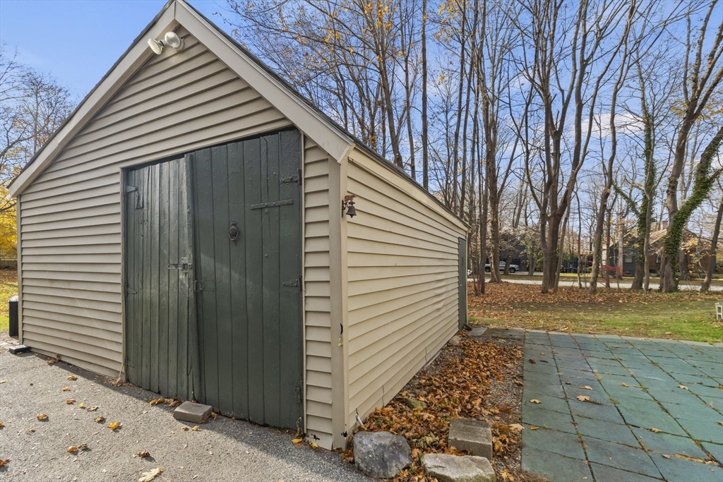 1142 Washington Street Whitman, MA 02382 - Photo 31 of 32 a view of a house with a yard
