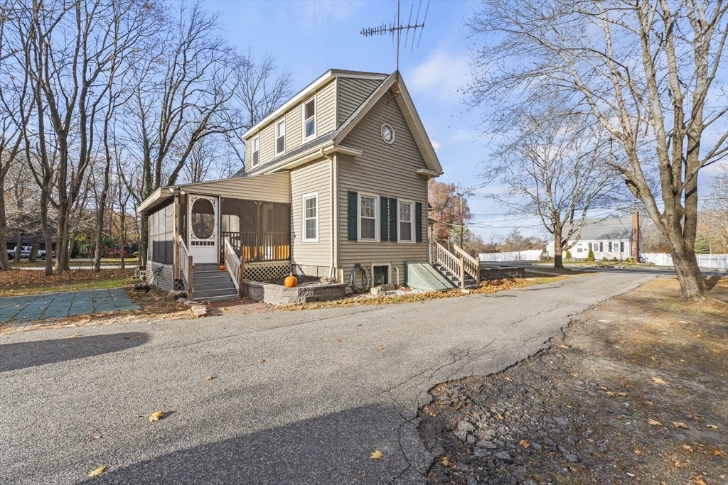 1142 Washington Street Whitman, MA 02382 - Photo 32 of 32 a view of a house with snow on the road