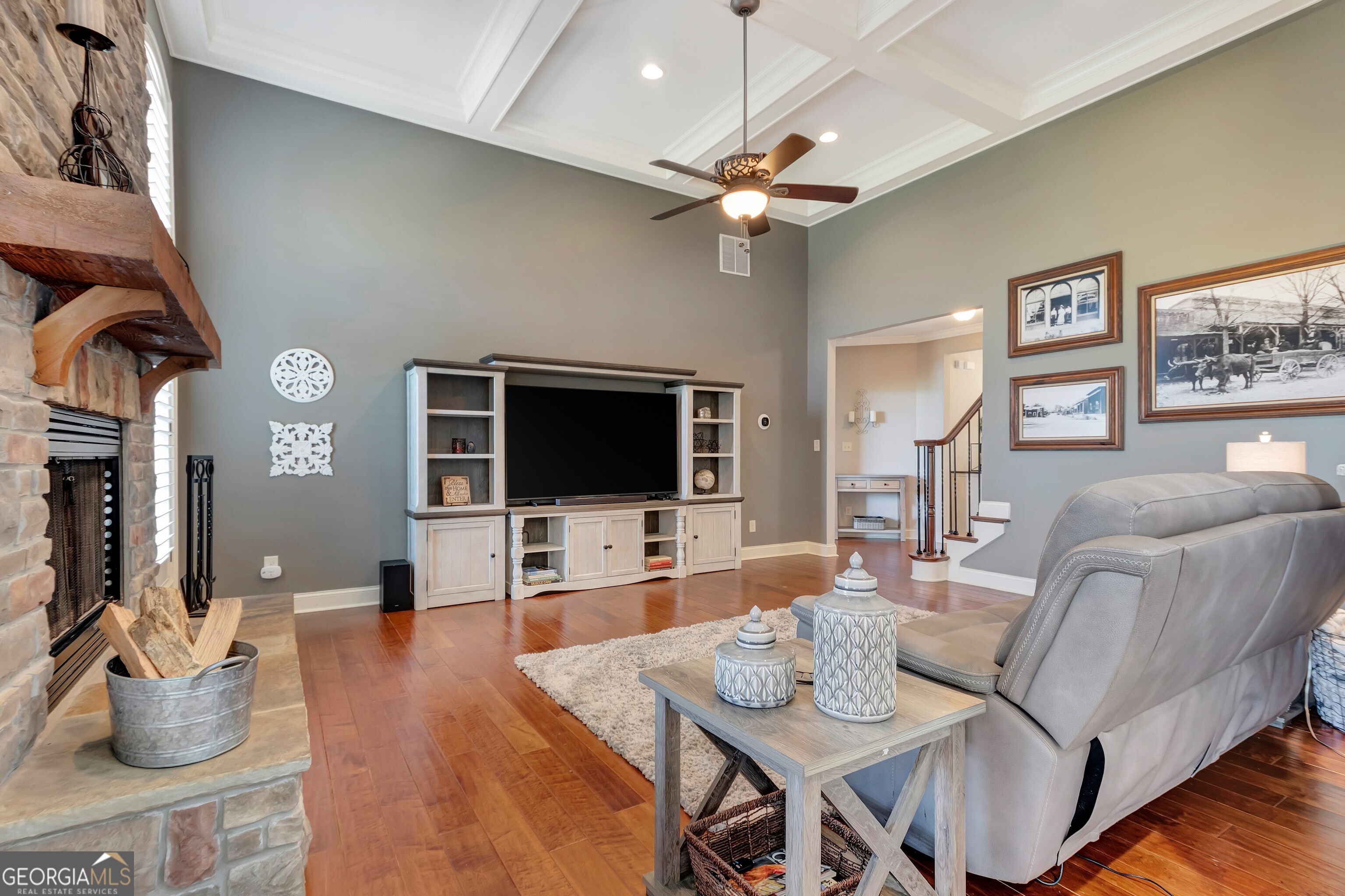 357 Brooks Road Brooks, GA 30205 - Photo 12 of 64 a living room with furniture a flat screen tv and kitchen view