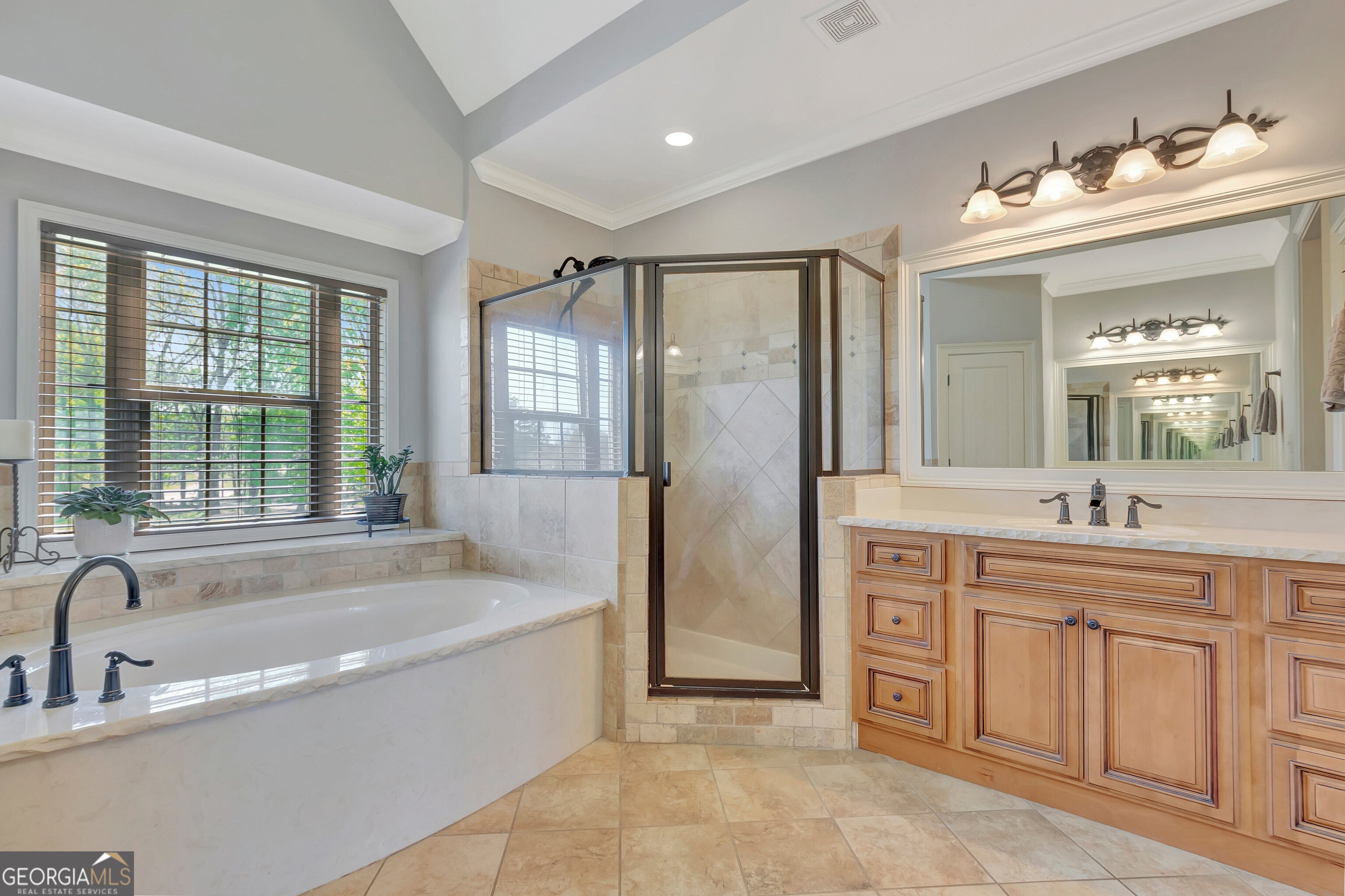 357 Brooks Road Brooks, GA 30205 - Photo 21 of 64 a spacious bathroom with a tub sink shower and mirror