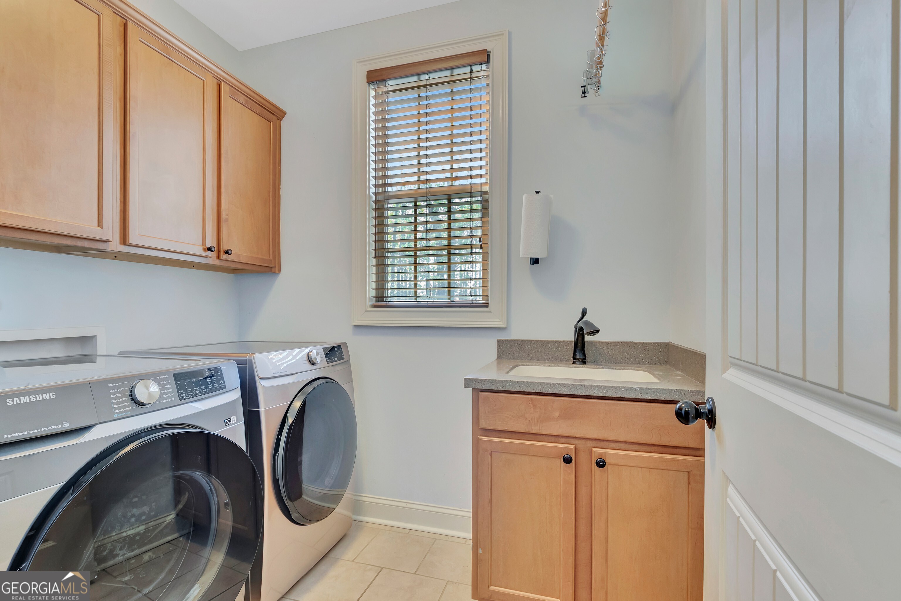 357 Brooks Road Brooks, GA 30205 - Photo 23 of 64 a utility room with sink dryer and washer