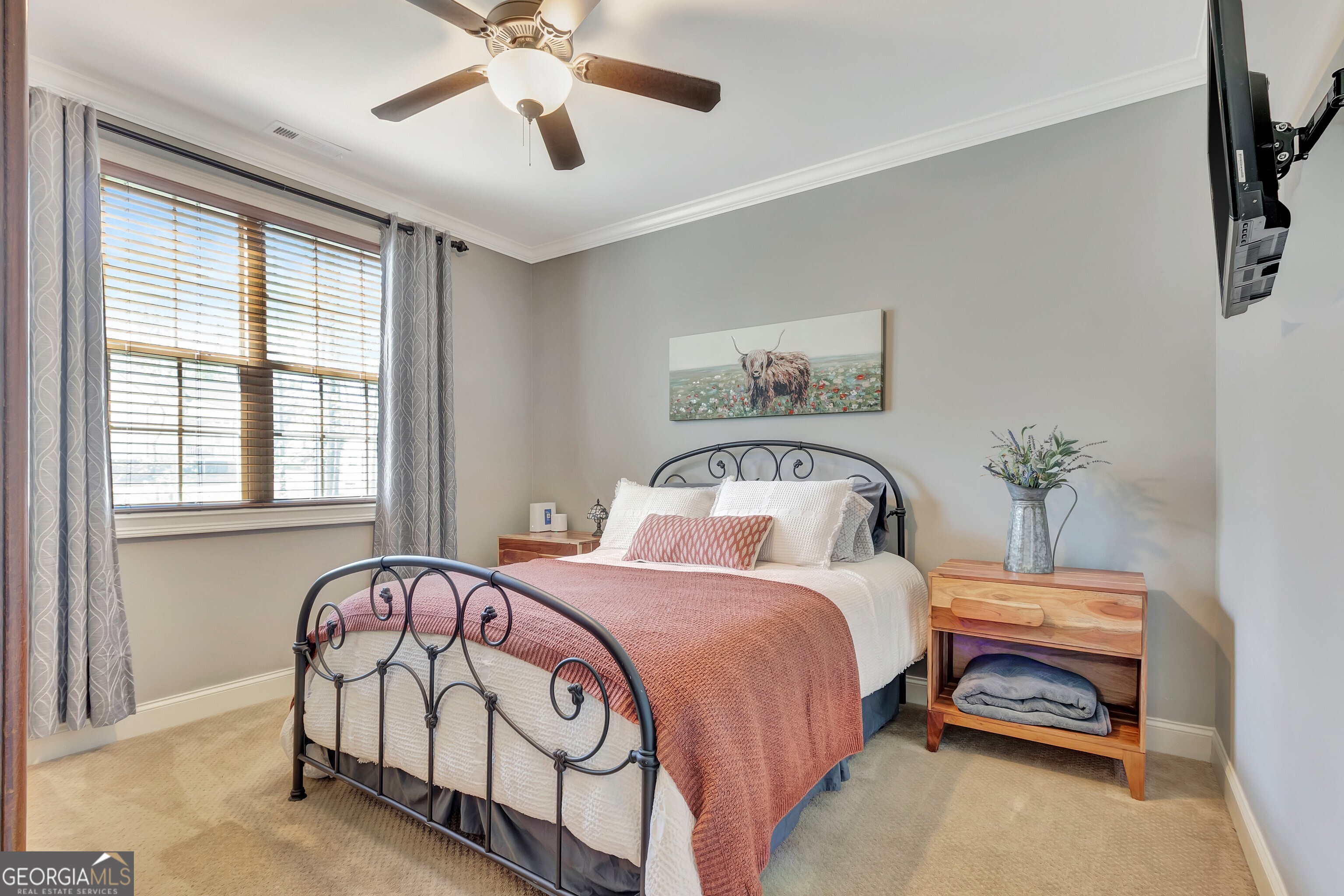 357 Brooks Road Brooks, GA 30205 - Photo 24 of 64 a bedroom with a bed and a chandelier