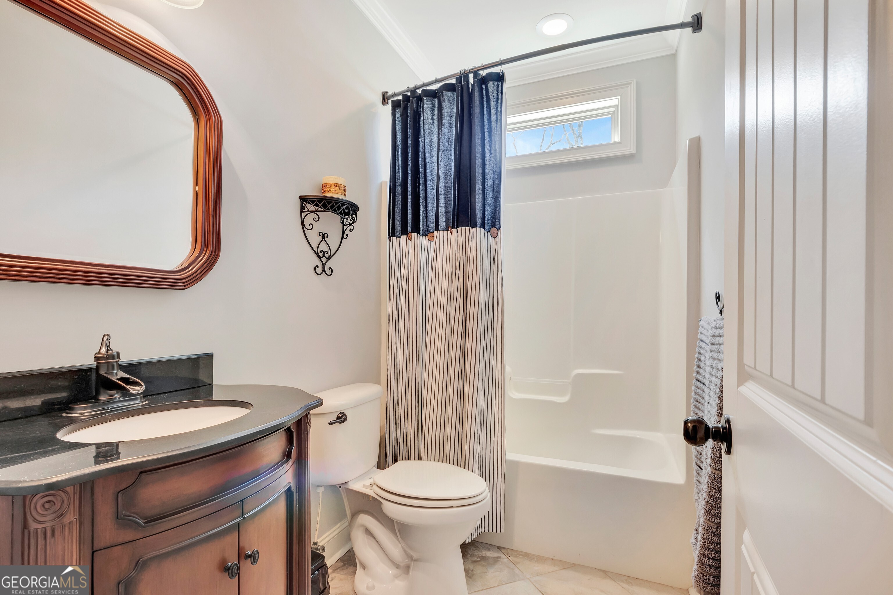 357 Brooks Road Brooks, GA 30205 - Photo 25 of 64 a bathroom with a sink a toilet and shower
