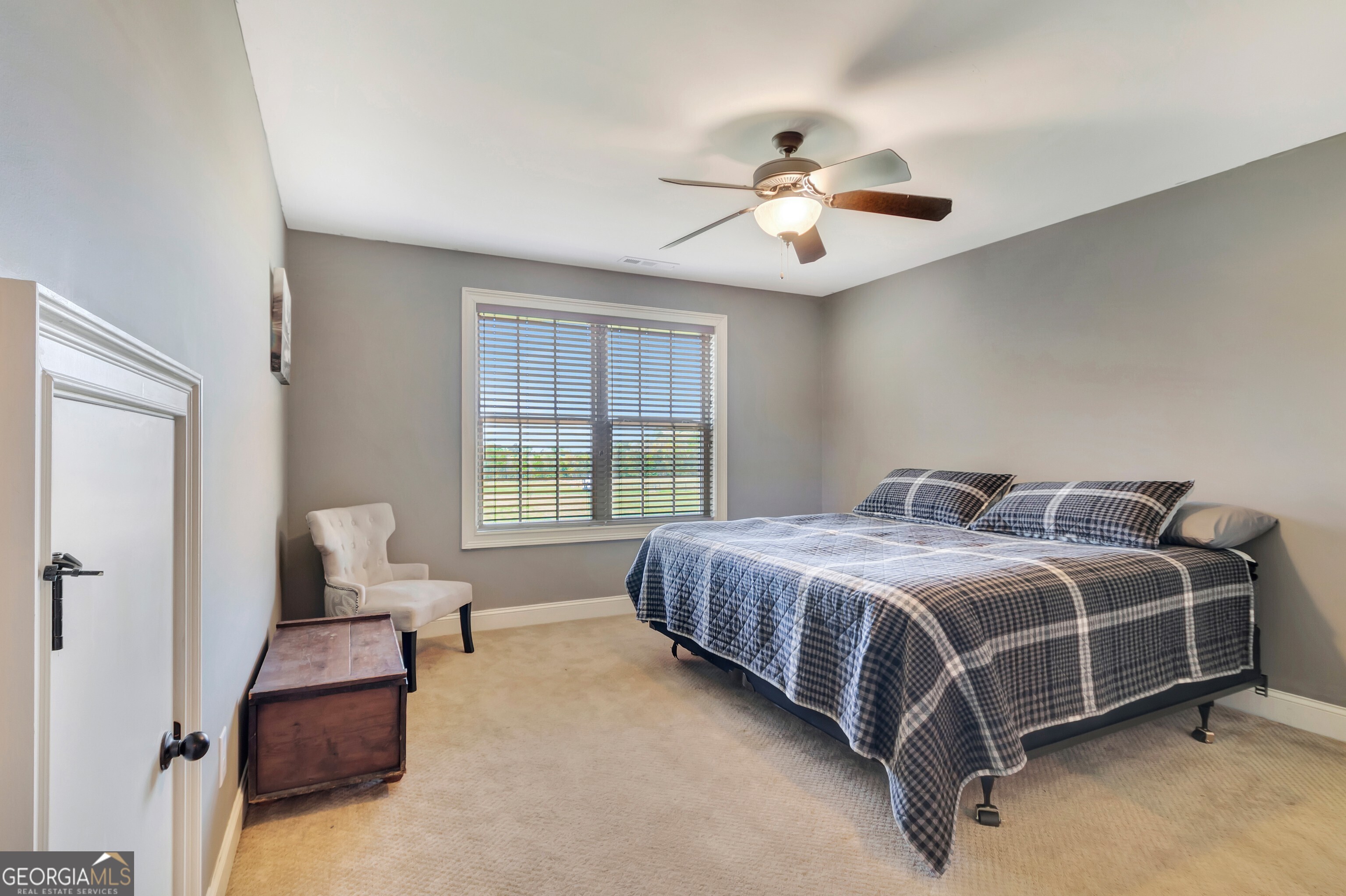 357 Brooks Road Brooks, GA 30205 - Photo 43 of 64 a spacious bedroom with a bed and window
