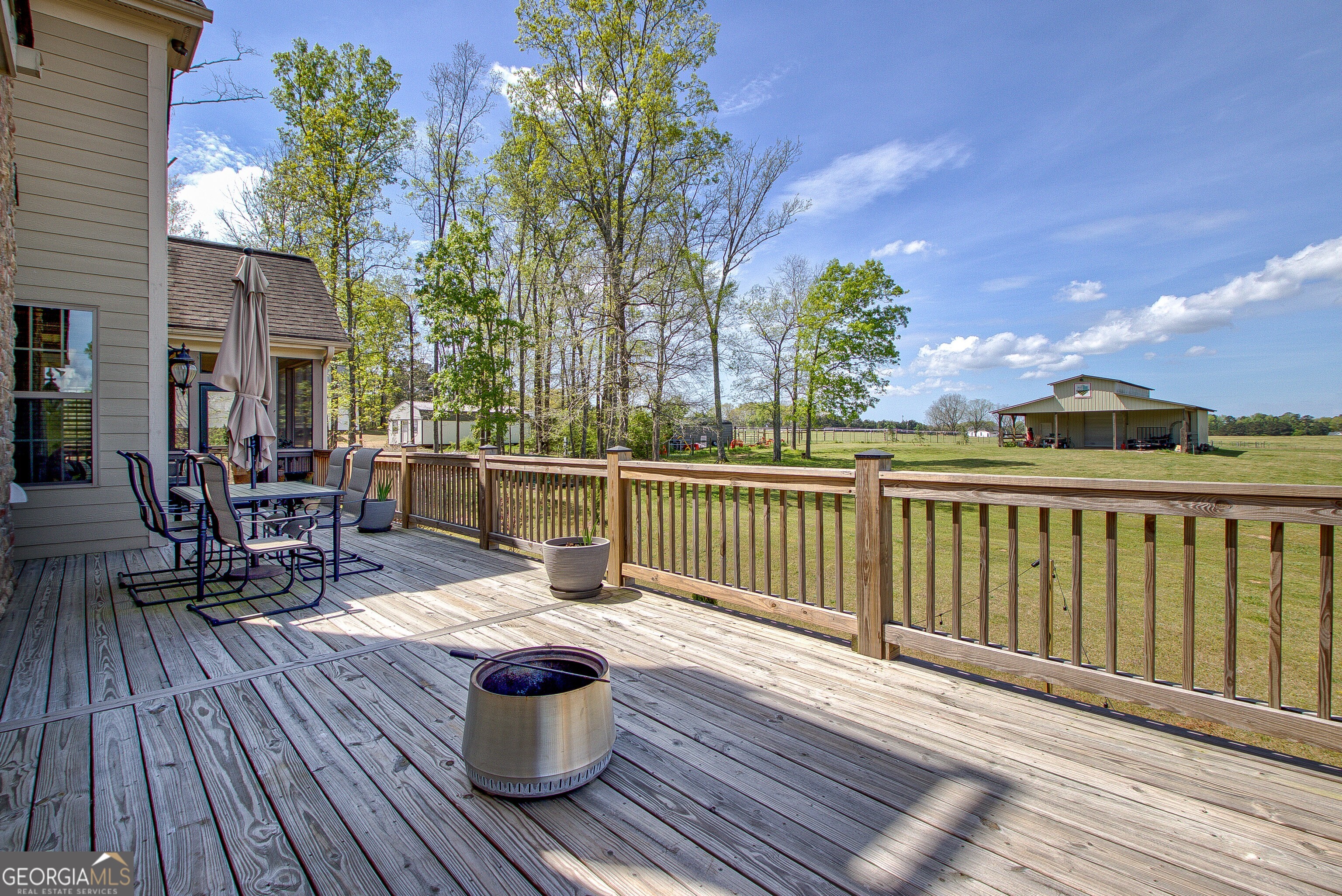 357 Brooks Road Brooks, GA 30205 - Photo 44 of 64 a view of balcony with wooden floor and seating space