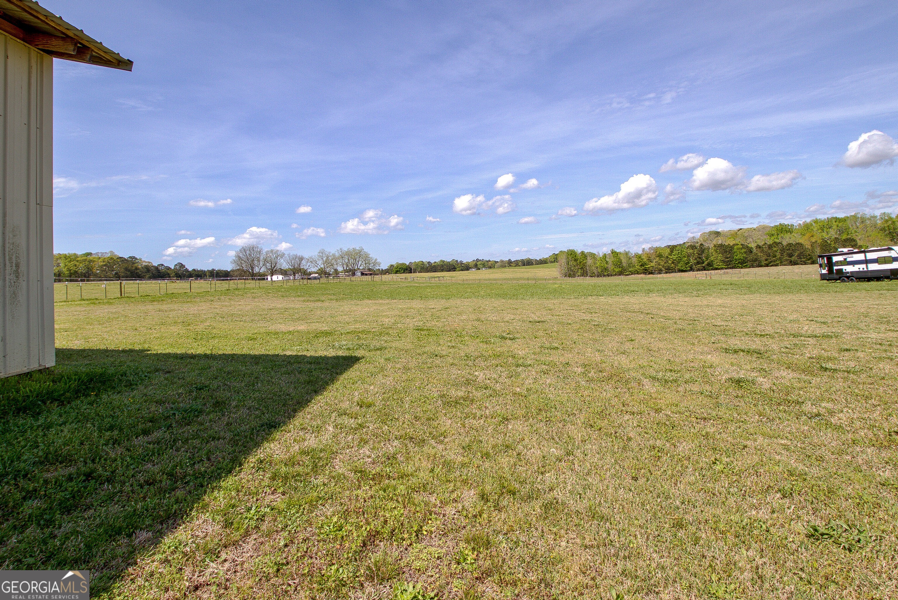 357 Brooks Road Brooks, GA 30205 - Photo 52 of 64 a view of an ocean and a building