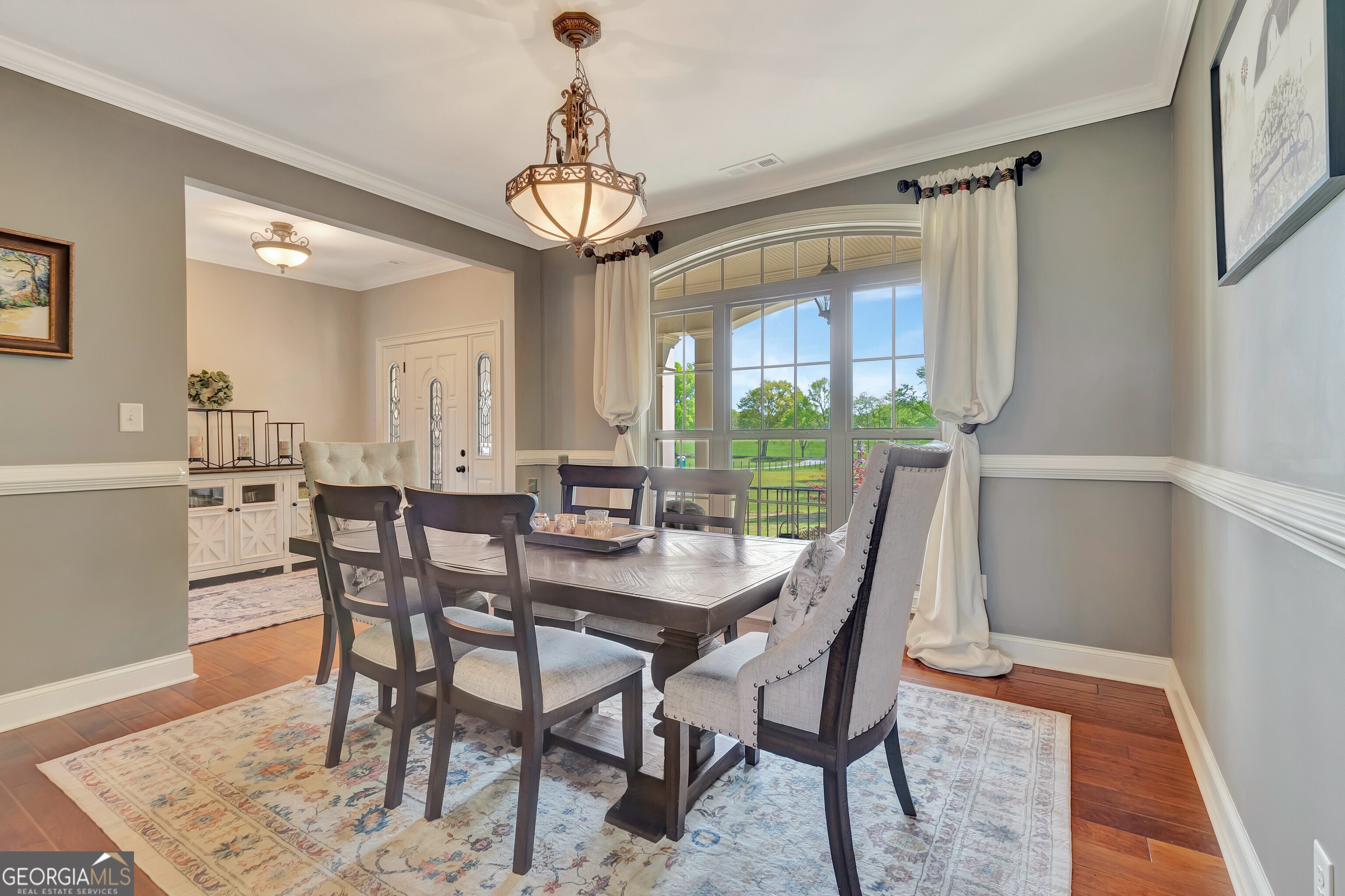 357 Brooks Road Brooks, GA 30205 - Photo 10 of 64 a view of a dining room with furniture window and wooden floor