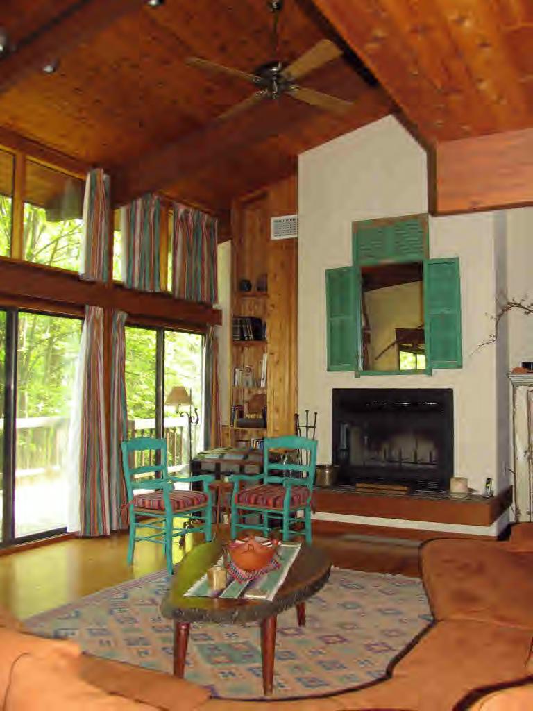 11 Rattlesnake Mountain Road Stockbridge, MA 01262 - Photo 2 of 6 a living room with fireplace furniture and a large window
