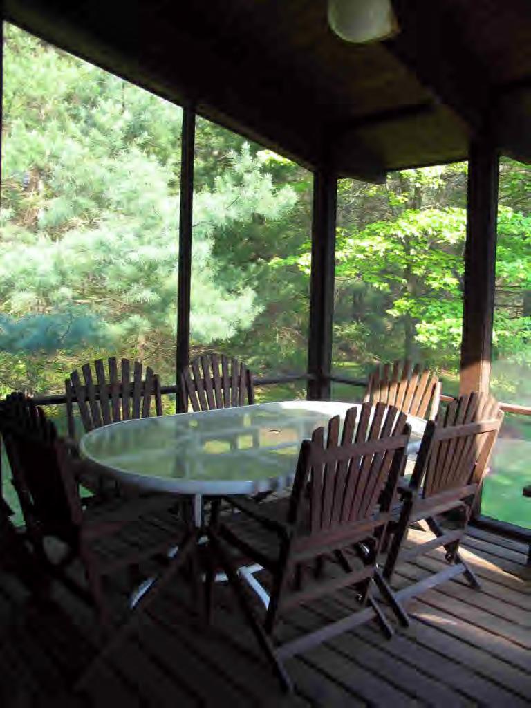 11 Rattlesnake Mountain Road Stockbridge, MA 01262 - Photo 3 of 6 a view of chairs and table in the patio