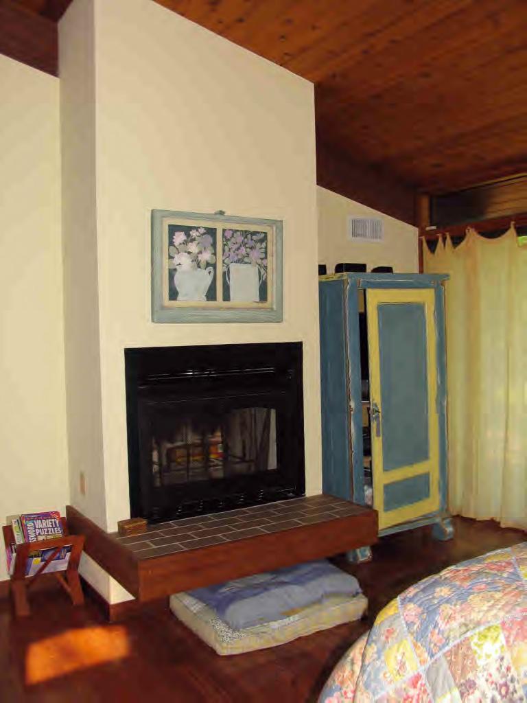 11 Rattlesnake Mountain Road Stockbridge, MA 01262 - Photo 4 of 6 a living room with furniture and a fireplace