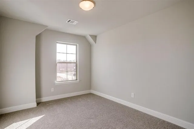 an empty room with window