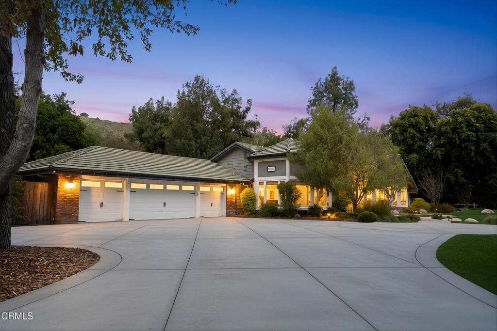 a view of swimming pool with outdoor seating and yard in back