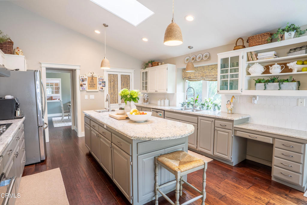 12075 East Pradera Road Camarillo, CA 93012 - Photo 13 of 54 a kitchen with a sink stove and cabinets