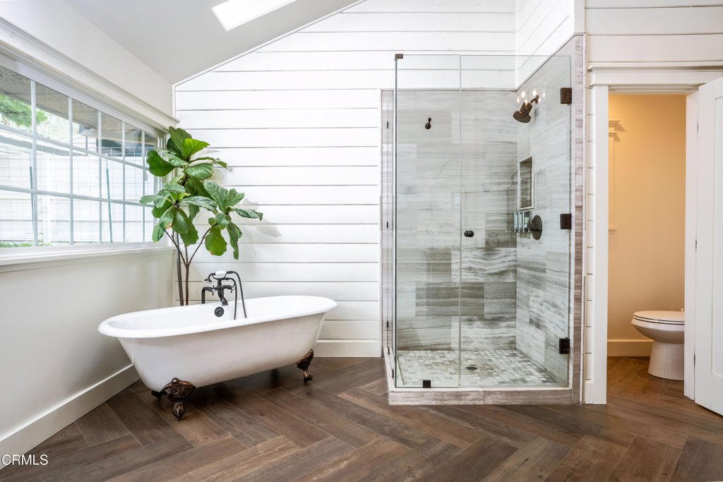 12075 East Pradera Road Camarillo, CA 93012 - Photo 28 of 54 a view of a bathroom with a bathtub and shower