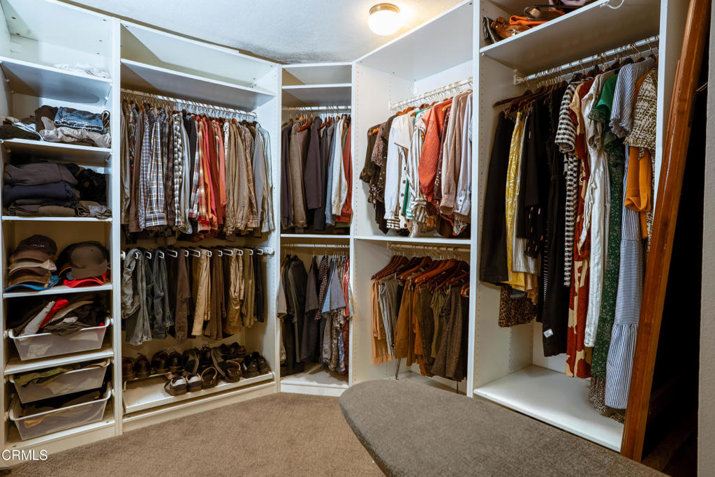 12075 East Pradera Road Camarillo, CA 93012 - Photo 31 of 54 a view of walk in closet with clothes and shoes