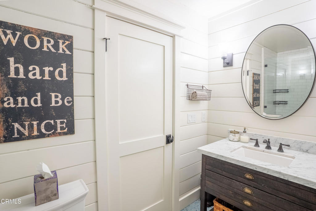 12075 East Pradera Road Camarillo, CA 93012 - Photo 37 of 54 a bathroom with a sink a mirror and a shower