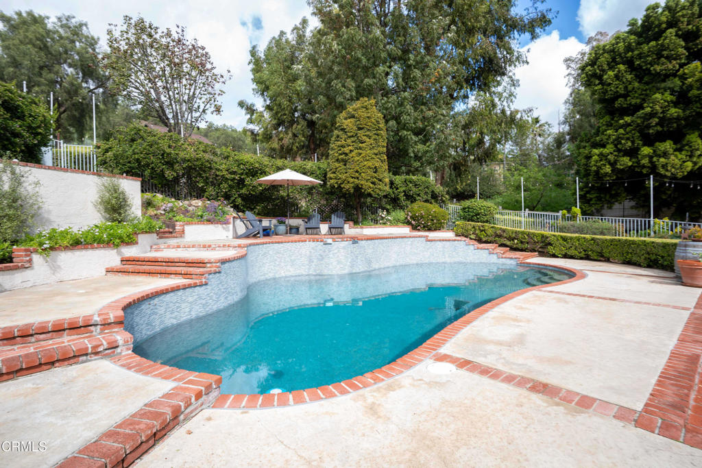12075 East Pradera Road Camarillo, CA 93012 - Photo 40 of 54 a view of a swimming pool with an outdoor space