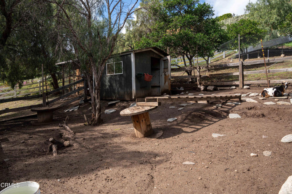 12075 East Pradera Road Camarillo, CA 93012 - Photo 47 of 54 a view of a house with backyard and trees