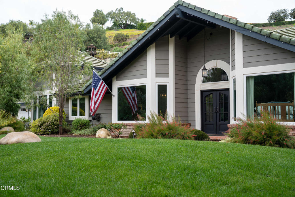 12075 East Pradera Road Camarillo, CA 93012 - Photo 5 of 54 a front view of a house with a garden