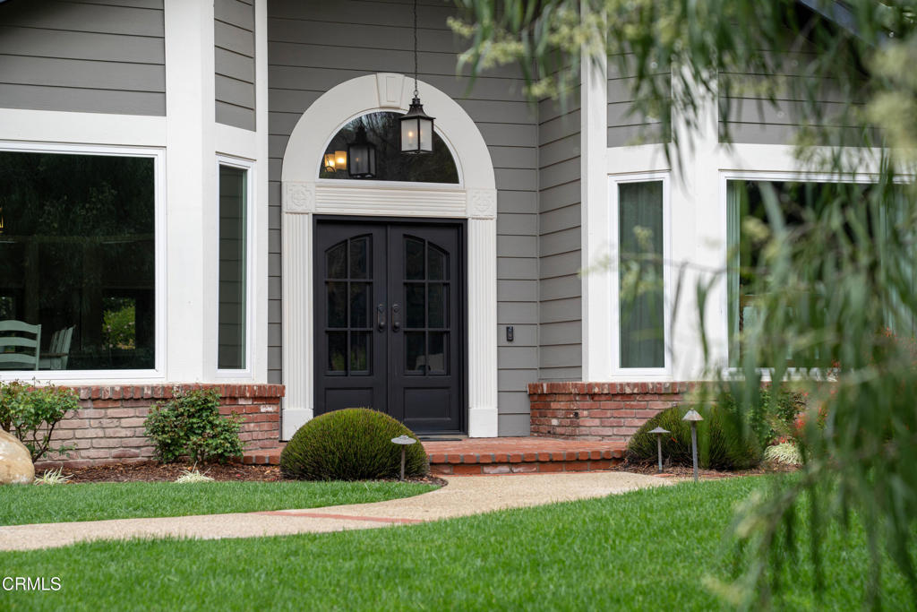 12075 East Pradera Road Camarillo, CA 93012 - Photo 7 of 54 a front view of a house with a yard