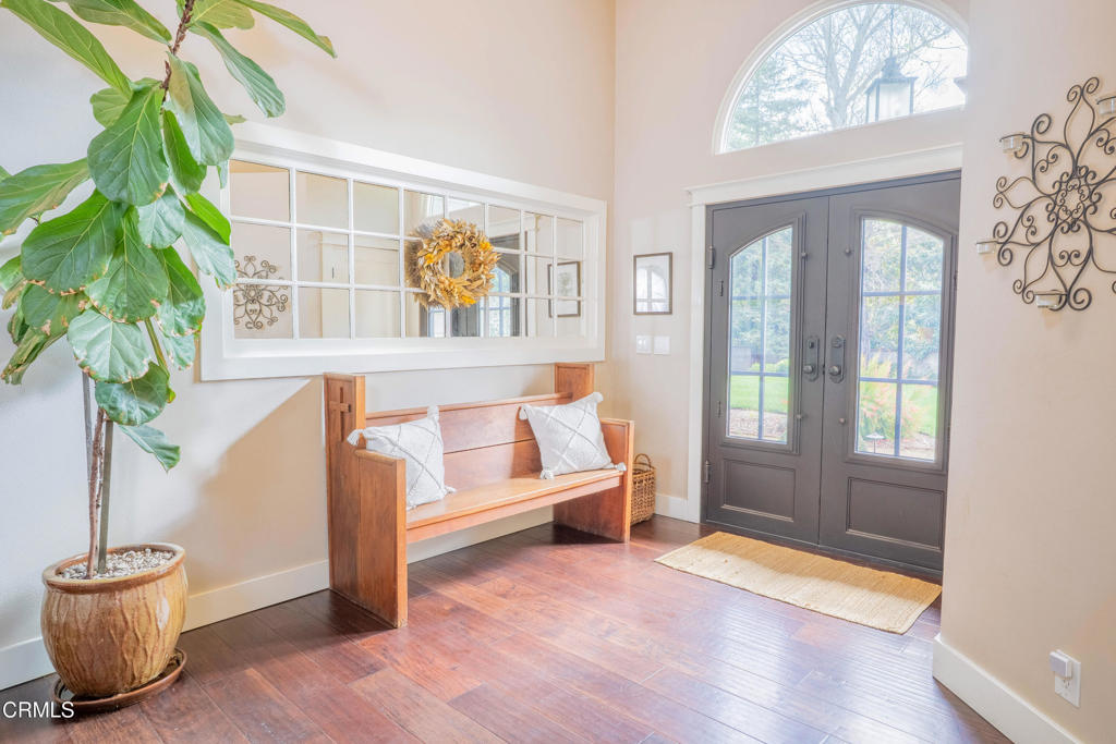 12075 East Pradera Road Camarillo, CA 93012 - Photo 9 of 54 a living room with furniture and a potted plant