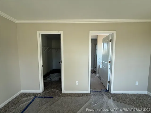 a view of a hallway with closet