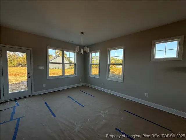 an empty room with windows