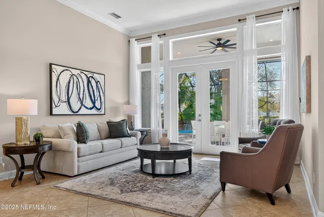 a view of a livingroom with furniture and a fireplace