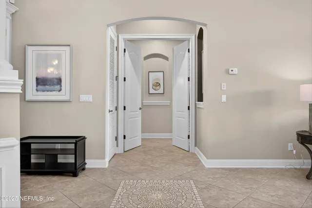 a bathroom with a toilet a sink and shower