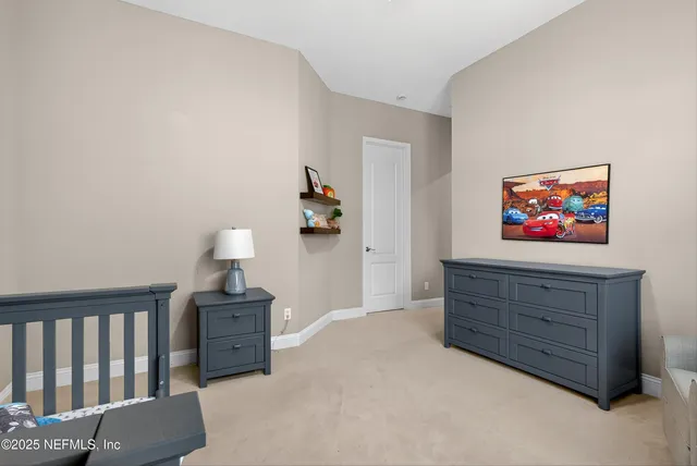 an aerial view of house with swimming pool