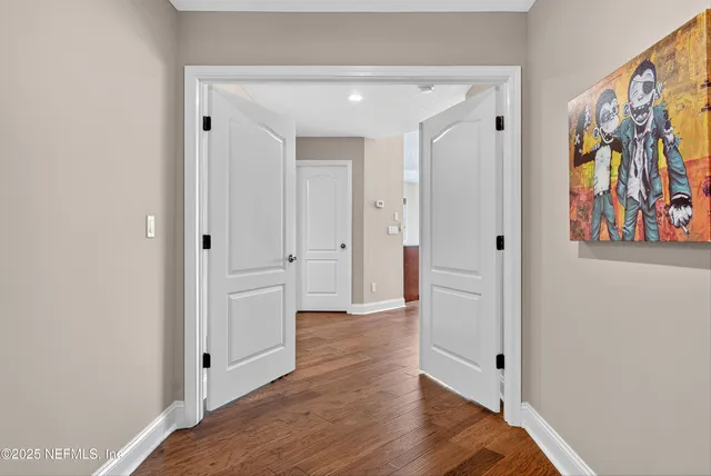 an aerial view of a house with a swimming pool yard and outdoor seating