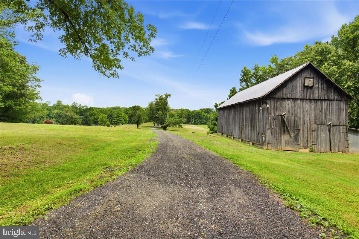 2175 Ponds Wood Road Huntingtown, MD 20639 - Photo 72 of 76 Heading down to the barn