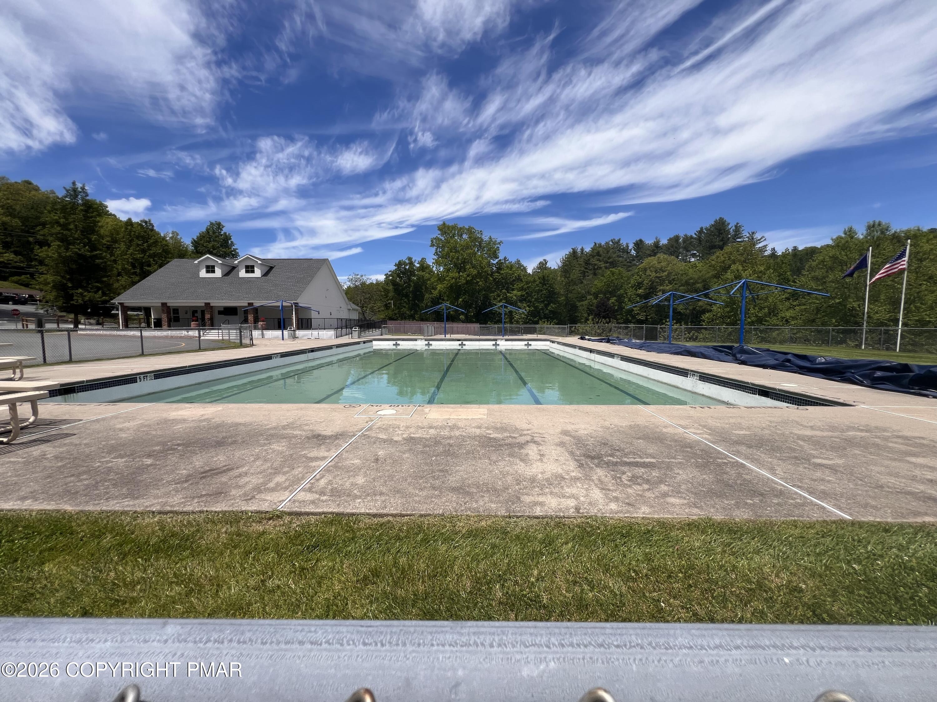 5709 Decker Road Bushkill, PA 18324 - Photo 31 of 32 a view of swimming pool with a yard