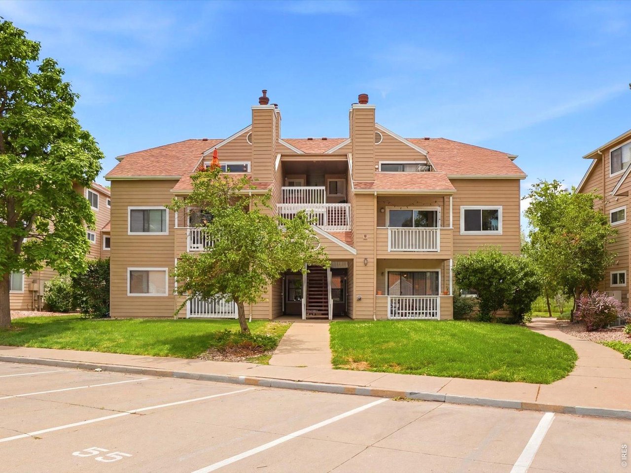 4945 Twin Lakes Road, Unit 46 Boulder, CO 80301 - Photo 2 of 42 Ideally positioned with reserved parking just steps away and surrounded by mature landscaping.