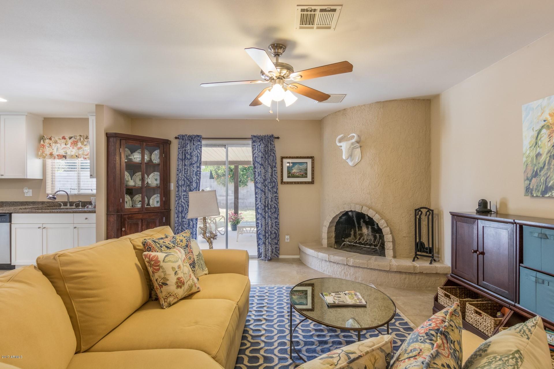 3717 East Yucca Street Phoenix, AZ 85028 - Photo 13 of 36 a living room with furniture and wooden floor