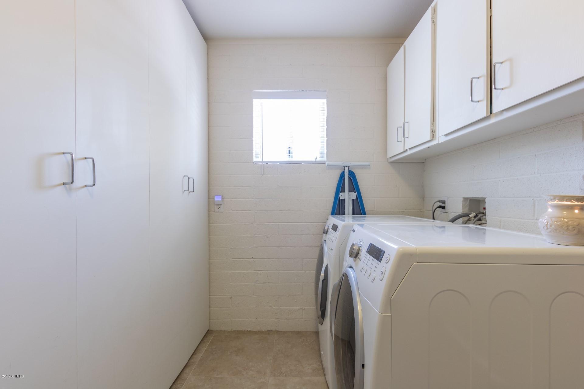 3717 East Yucca Street Phoenix, AZ 85028 - Photo 27 of 36 a utility room with dryer and washer
