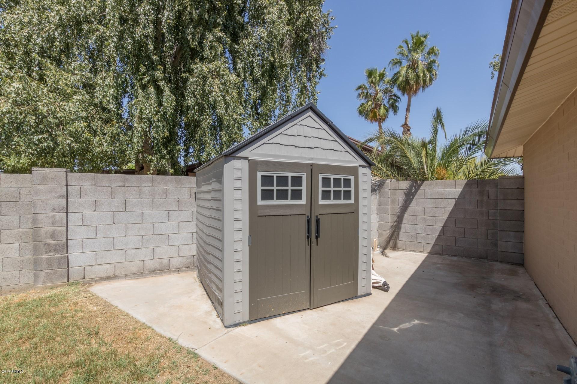 3717 East Yucca Street Phoenix, AZ 85028 - Photo 36 of 36 a picture of a house with a yard