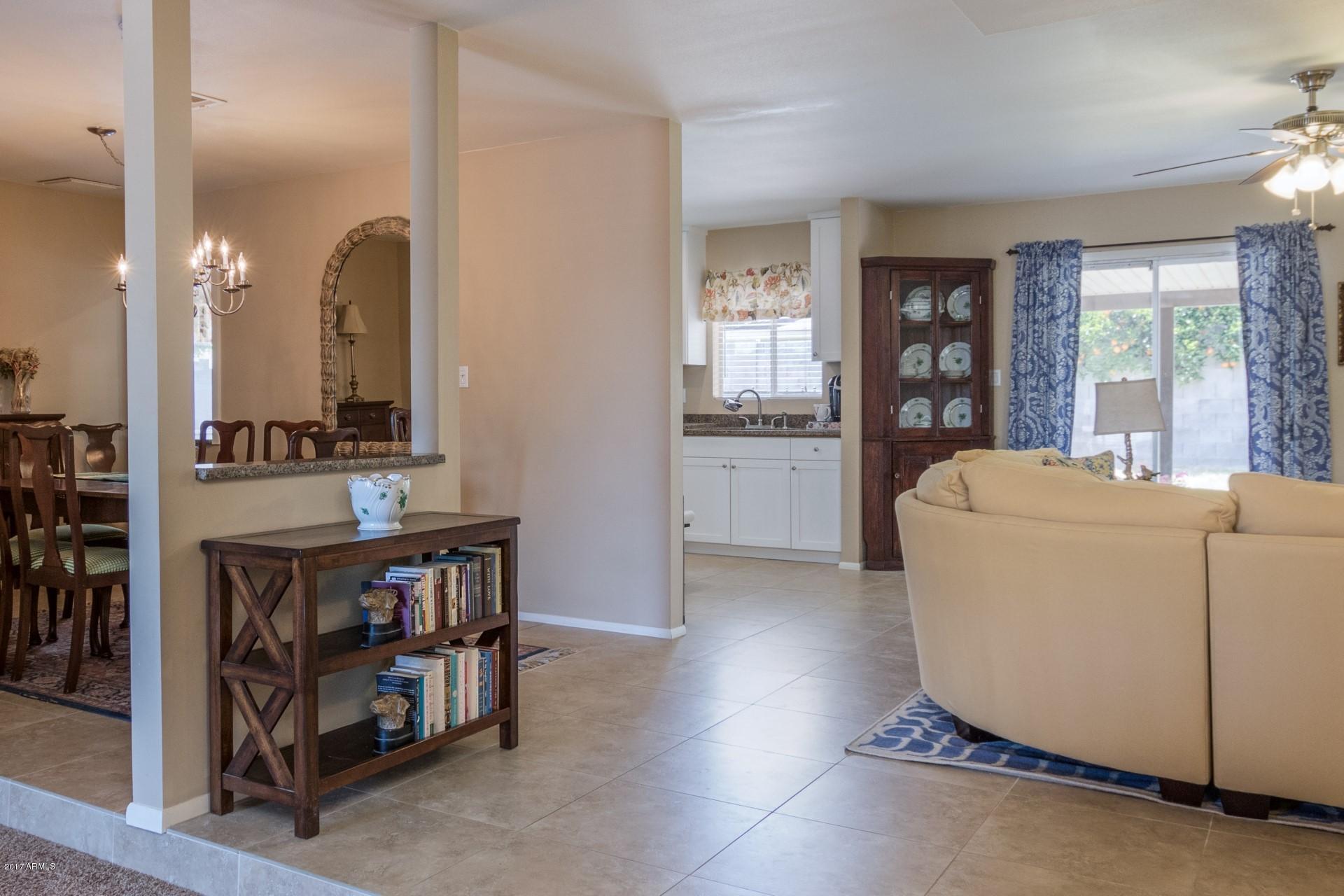 3717 East Yucca Street Phoenix, AZ 85028 - Photo 8 of 36 a room with furniture and window