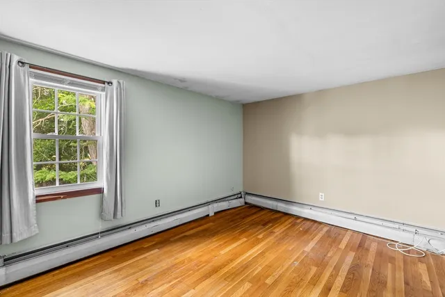 a view of a room with a large window