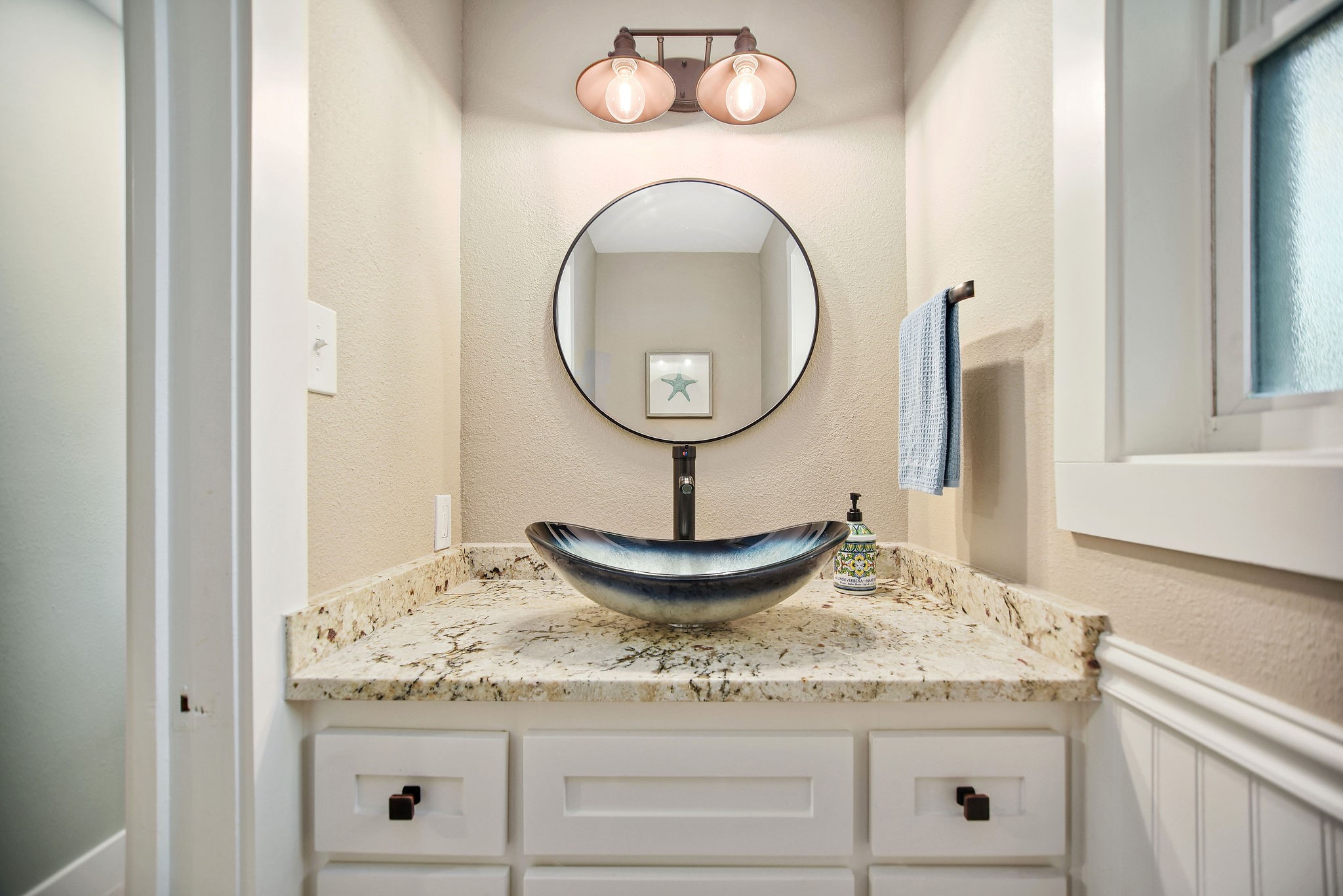 8 Las Brisas Place Port Lavaca, TX 77979 - Photo 29 of 50 a bathroom with a granite countertop sink and a mirror