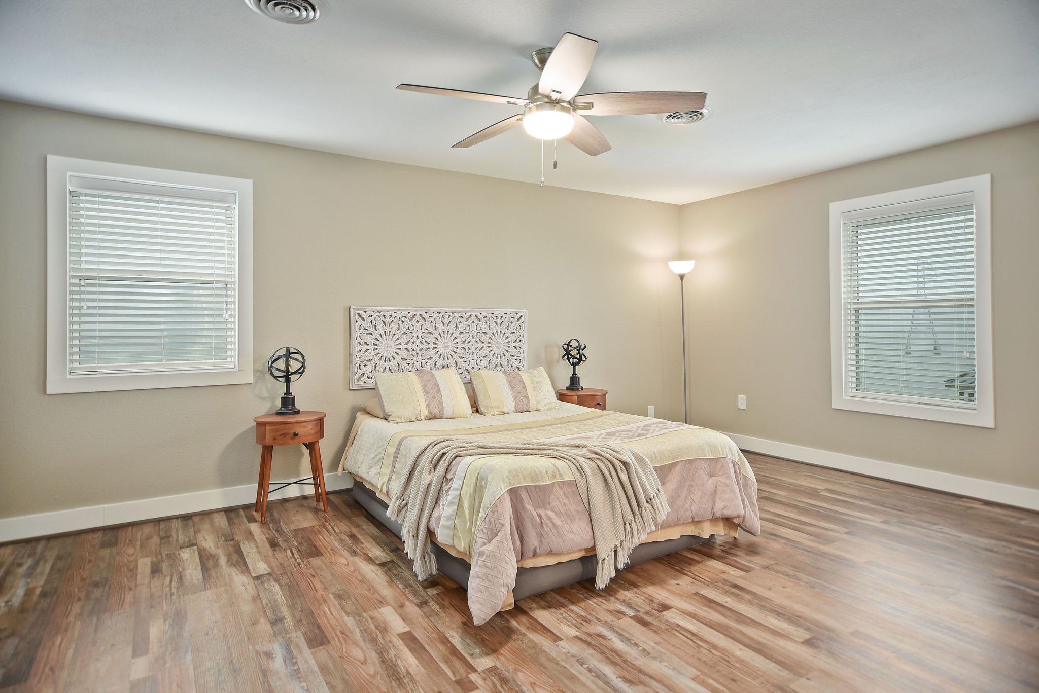 8 Las Brisas Place Port Lavaca, TX 77979 - Photo 30 of 50 a bedroom with a large bed and a window