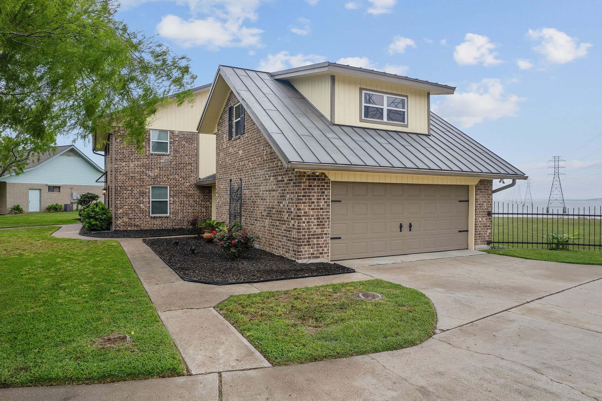8 Las Brisas Place Port Lavaca, TX 77979 - Photo 4 of 50 a front view of a house with a garden