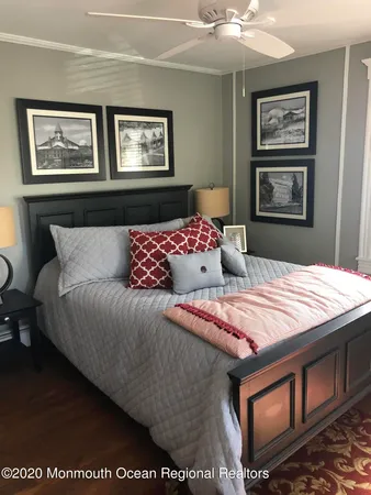 a bedroom with furniture and window