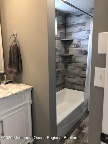 a bathroom with a bathtub