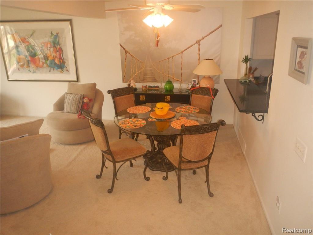 629 Summit Ridge Drive, Unit 13 Milford, MI 48381 - Photo 9 of 59 DINING AREA IN GREAT ROOM