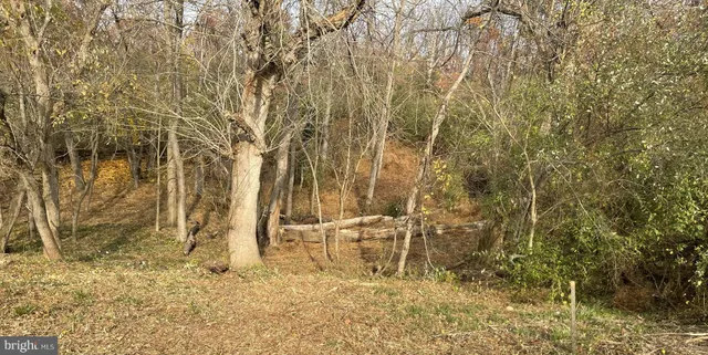 a view of wooden fence of a house