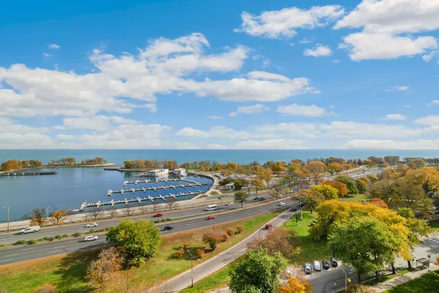 a view of a city and ocean